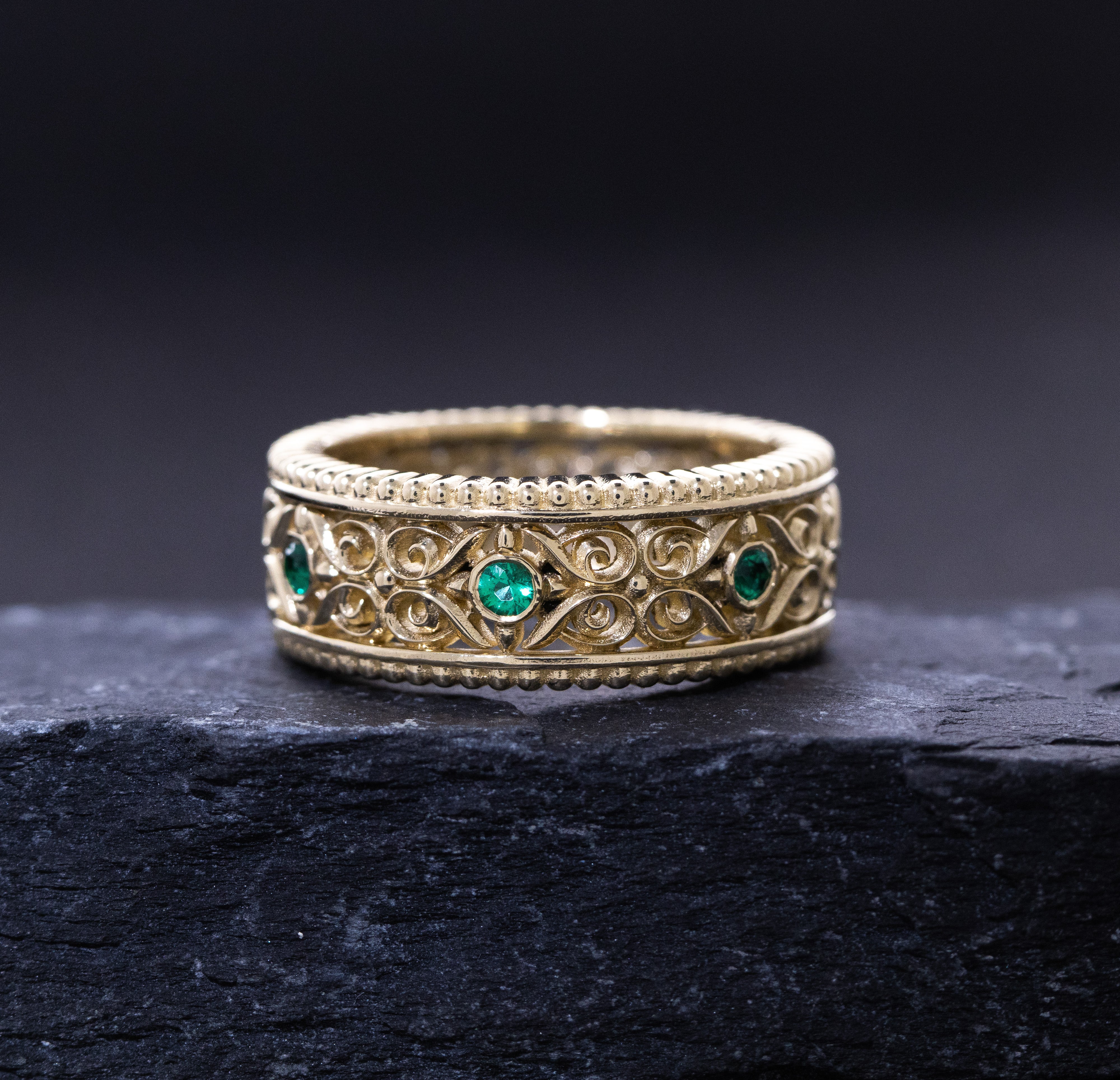 7mm Custom Made, 14k Solid Yellow Gold Band with Victorian Floral Reliefs and Green Emeralds