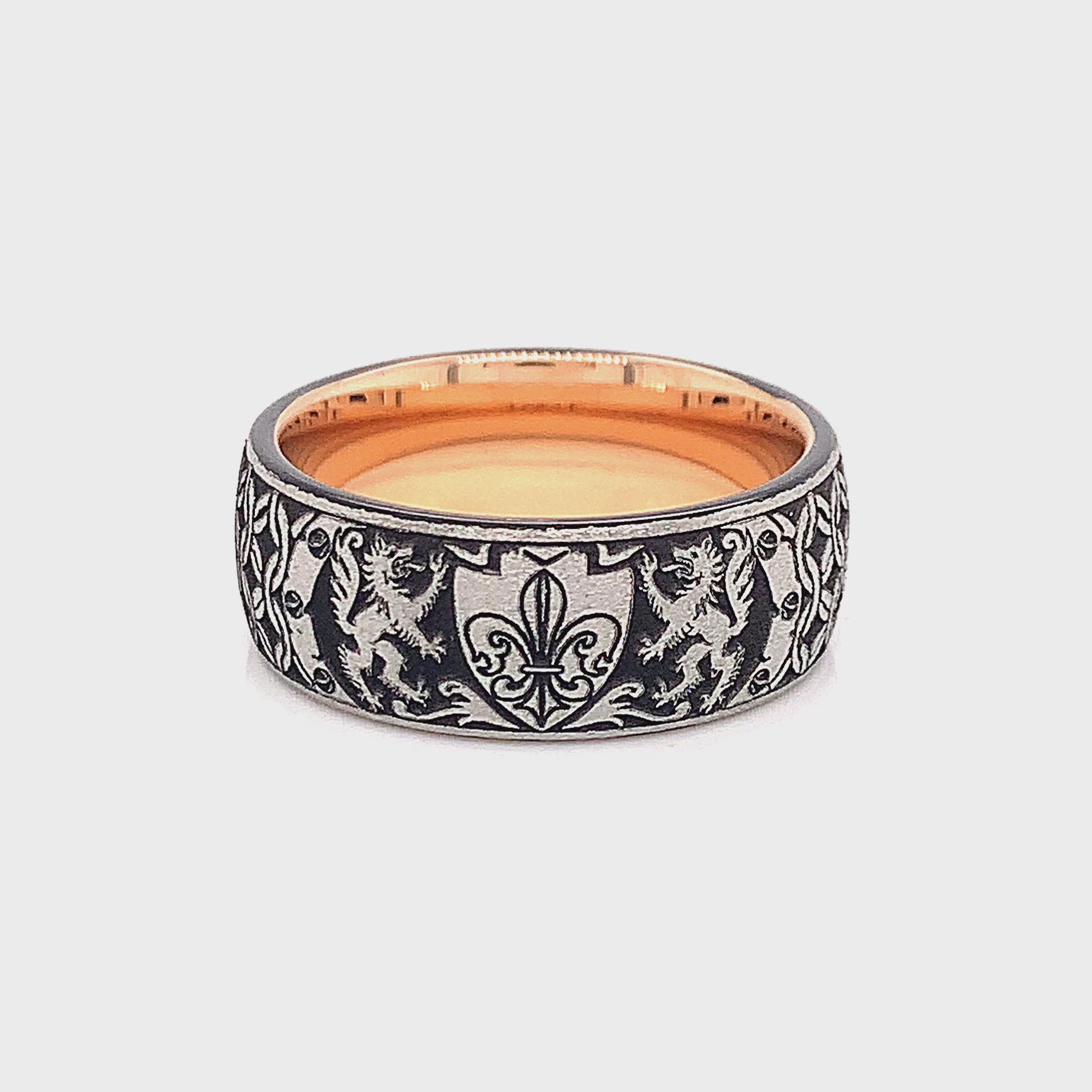 tungsten ring, wedding band, mens wedding band, women's wedding band, tungsten ring with rose gold plated interior, rose gold plated ring, fleur de lis ring, engraved ring, engraved wedding band, custom wedding band, personalized ring, mens wedding band, women's wedding band, rose gold ring, ring with shield, ring with wolves, wolf engraving Edit alt text