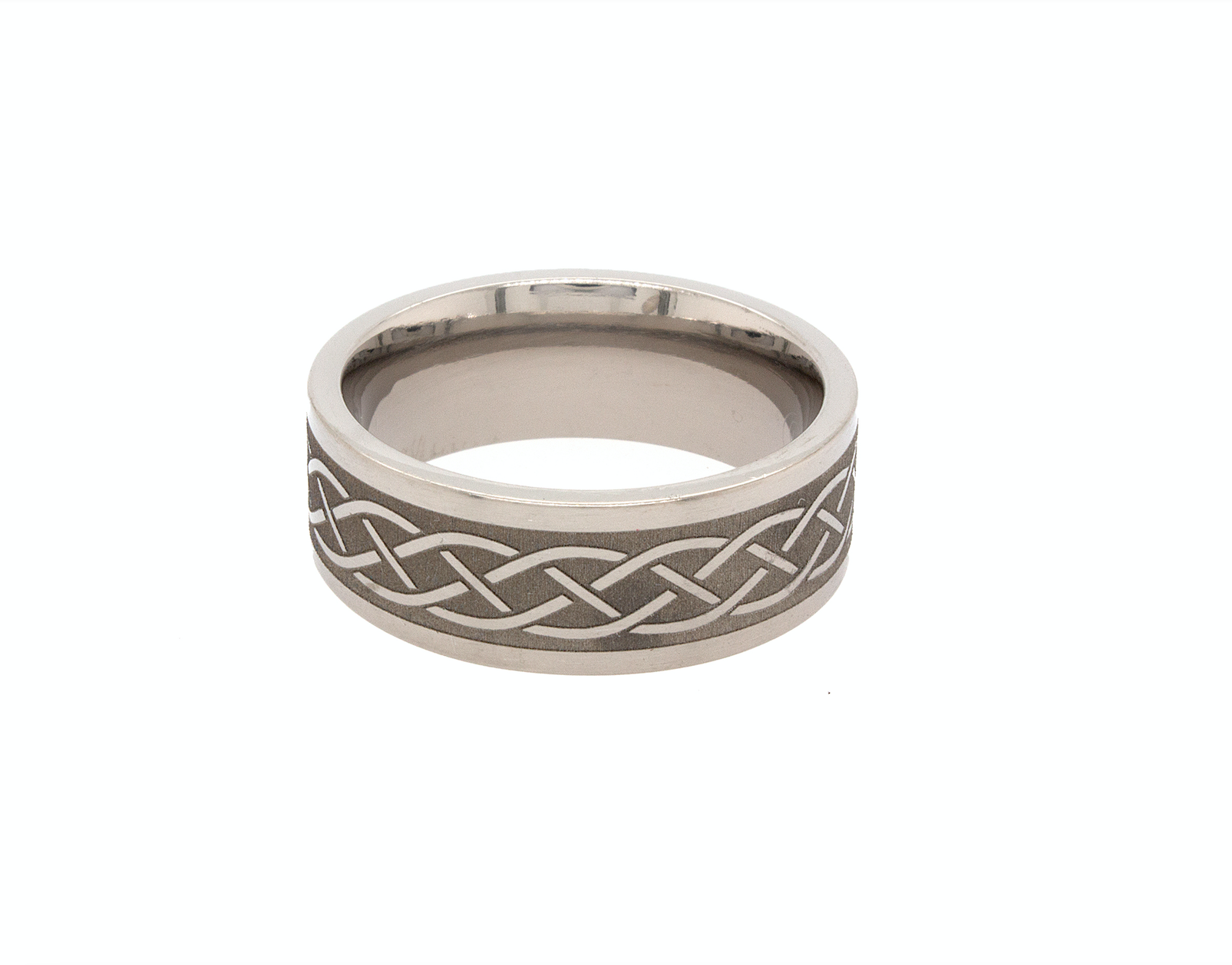 ring, ring on white background, titanium ring, titanium wedding band, celtic knot ring, celtic knot engraving, engraved ring, irish ring, custom wedding band, personalized ring, brushed ring, wedding band for men, custom wedding band