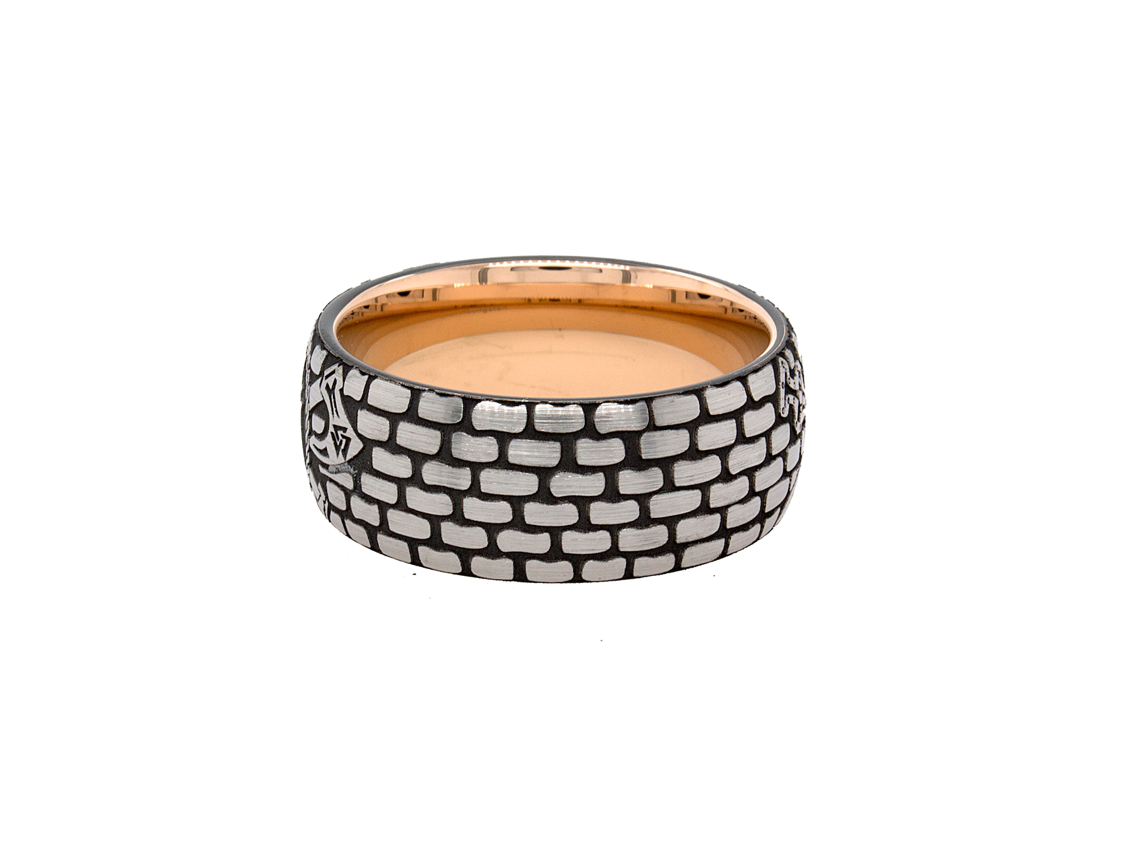 rin, ring on white background, ring with rose gold plating, ring with brick pattern, ring with initial, ring with letter g engraved, ring with ax engravings, viking inspired ring, viking ring, tungsten wedding band, mens wedding band, 9mm ring, women's wedding band, personalized wedding band, custom wedding band