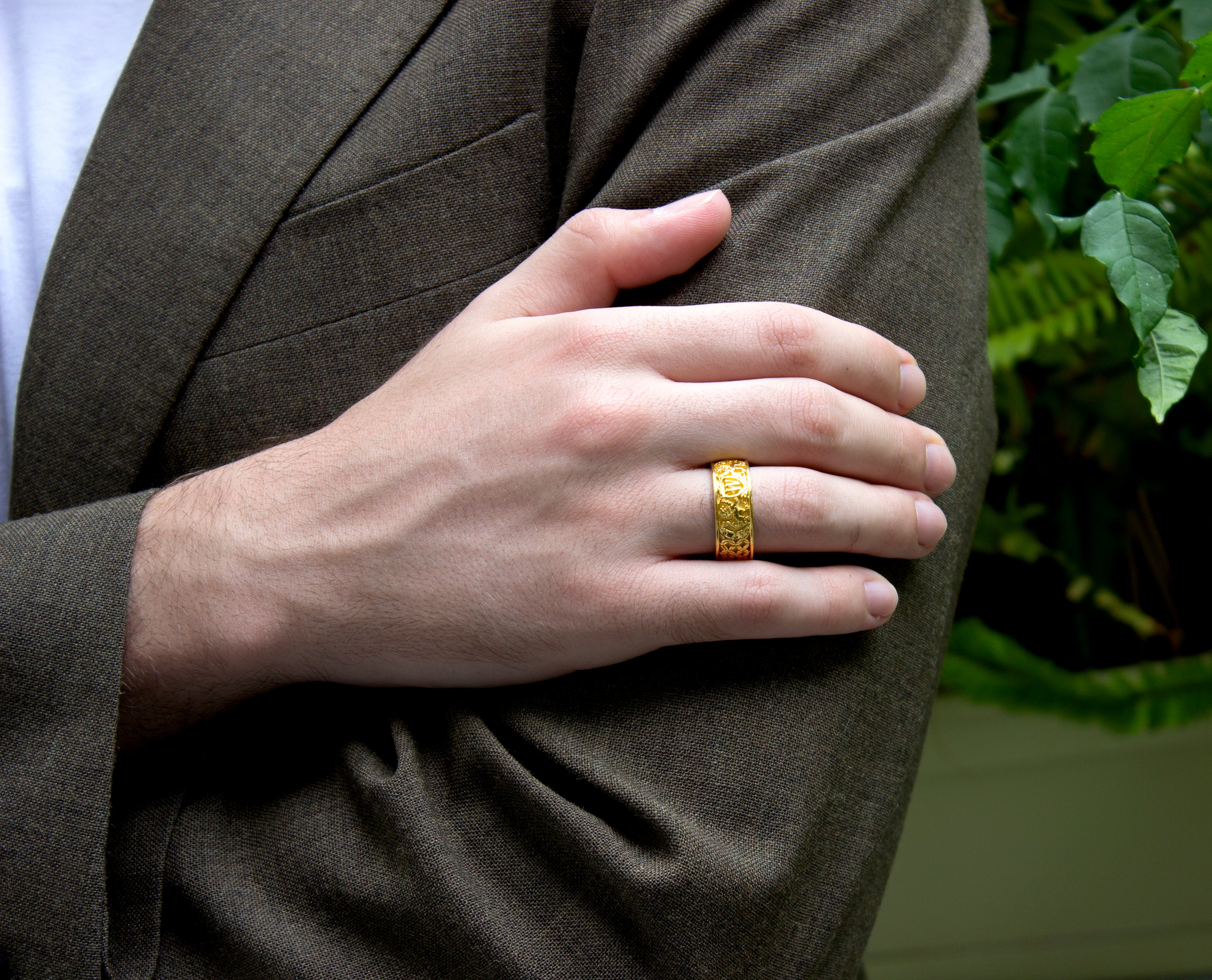 ring, ring on model, ring on hand, gold ring, solid gold ring, yellow gold ring, engraved ring, ring with initial, ring with lions, medieval ring, wedding band, mens wedding band, womens wedding band, unisex ring, unique rings
