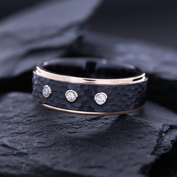 8mm Hammered Black Zirconium Ring with Three Princess Cut Diamonds and Solid Rose Gold Edges