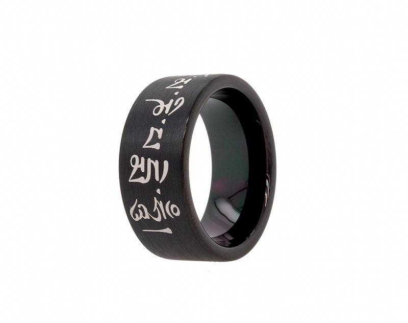 ring, ring on white background, black ring, black plated tungsten ring, pipe cut ring, brush finished ring, ring with engraving, buddhist engraving, ring with buddhist saying engraving, custom wedding band, personalized wedding band, engraved ring, ring with engraving