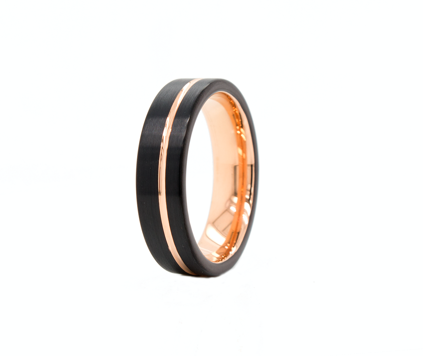 ring, ring on white background, black ring, rose gold ring, black plated tungsten, tungsten wedding band, rose gold wedding band, flat shaped ring, brushed tungsten ring, ring with offset groove, black and rose gold ring, wedding band, mens wedding band, women's wedding band