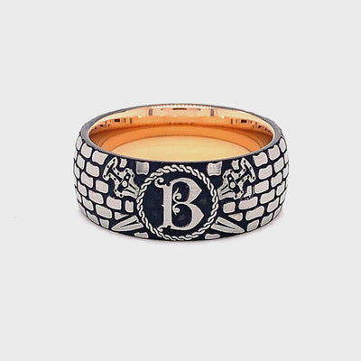 rin, ring on white background, ring with rose gold plating, ring with brick pattern, ring with initial, ring with letter g engraved, ring with ax engravings, viking inspired ring, viking ring, tungsten wedding band, mens wedding band, 9mm ring, women's wedding band, personalized wedding band, custom wedding band