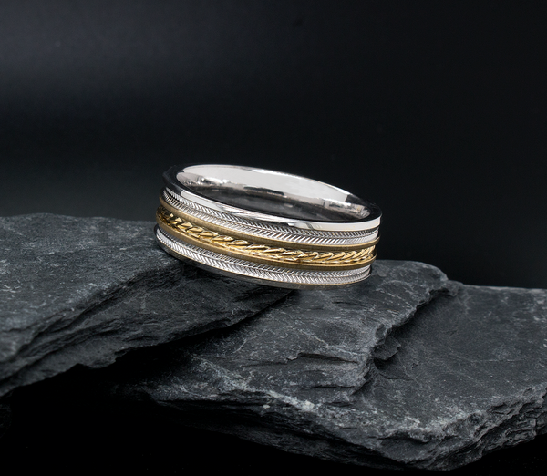 ring, ring on black background, solid gold ring, white gold ring, yellow gold ring, textured ring, engraved ring, two-toned ring, wedding band, flat shaped ring, mens wedding band, womens wedding band, unisex ring