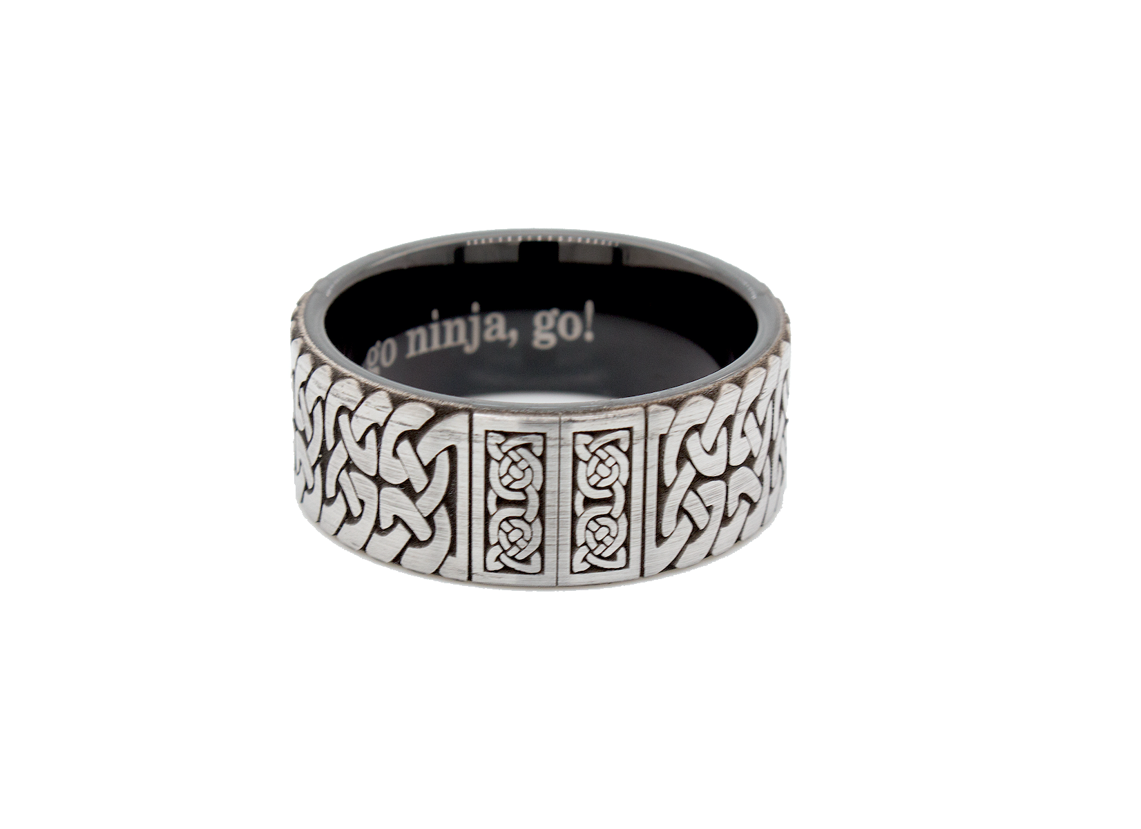 ring, ring with white backgrounds, tungsten wedding band, black plated tungsten, celtic knot engraving, celtic ring, celtic pattern, engraved ring, pipe cut ring