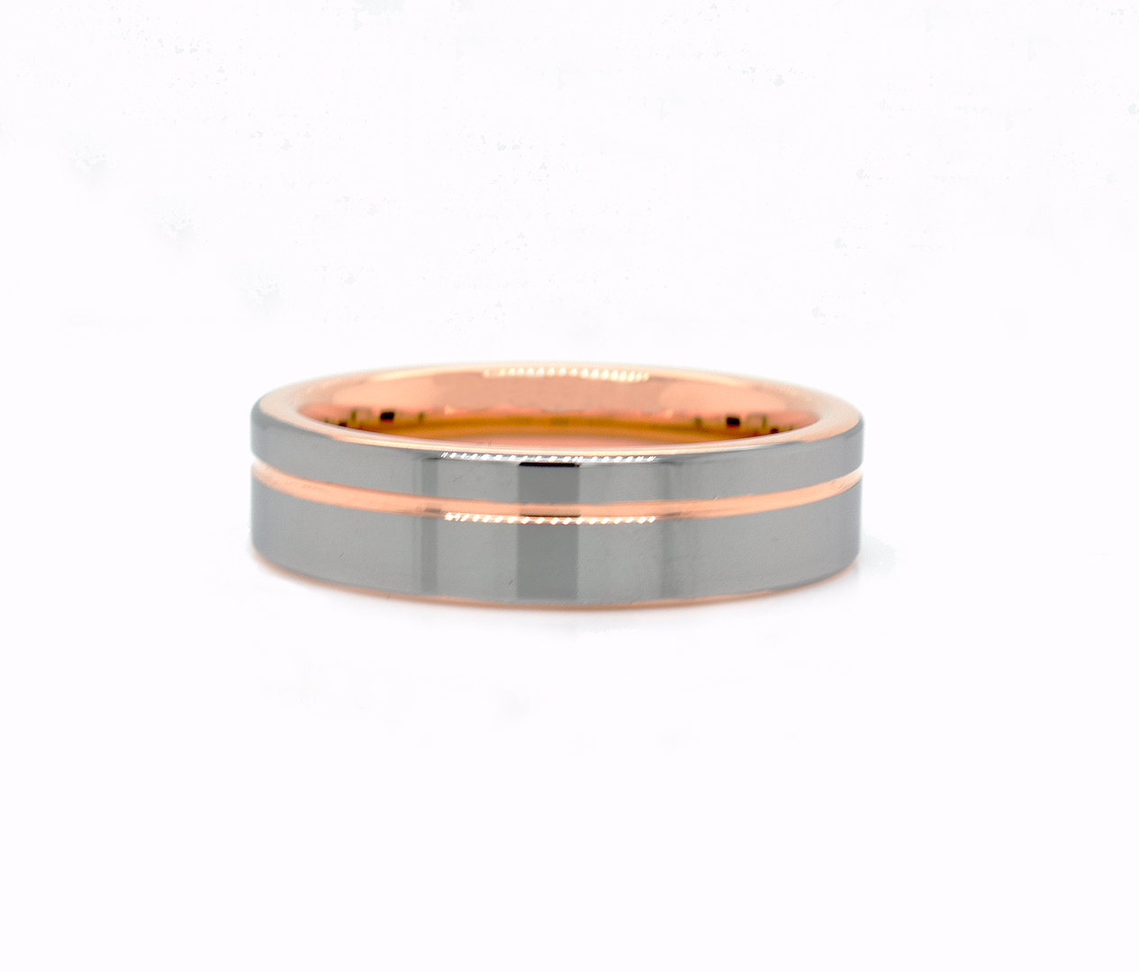 ring, ring with white background, wedding band, thin ring, flat shaped ring, ring with rose gold plated interior, ring with offset groove, grooved ring, polished tungsten ring, wedding band, women's wedding band, mens wedding band