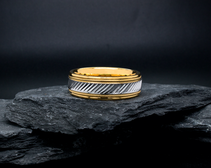 two toned ring, solid gold ring, white gold and yellow gold ring, grooved pattern, diagonal grooves, stepped edges, migrain engraving, polished ring, mens wedding band, womens wedding band, unisex ring, custom made ring, ring on rocks