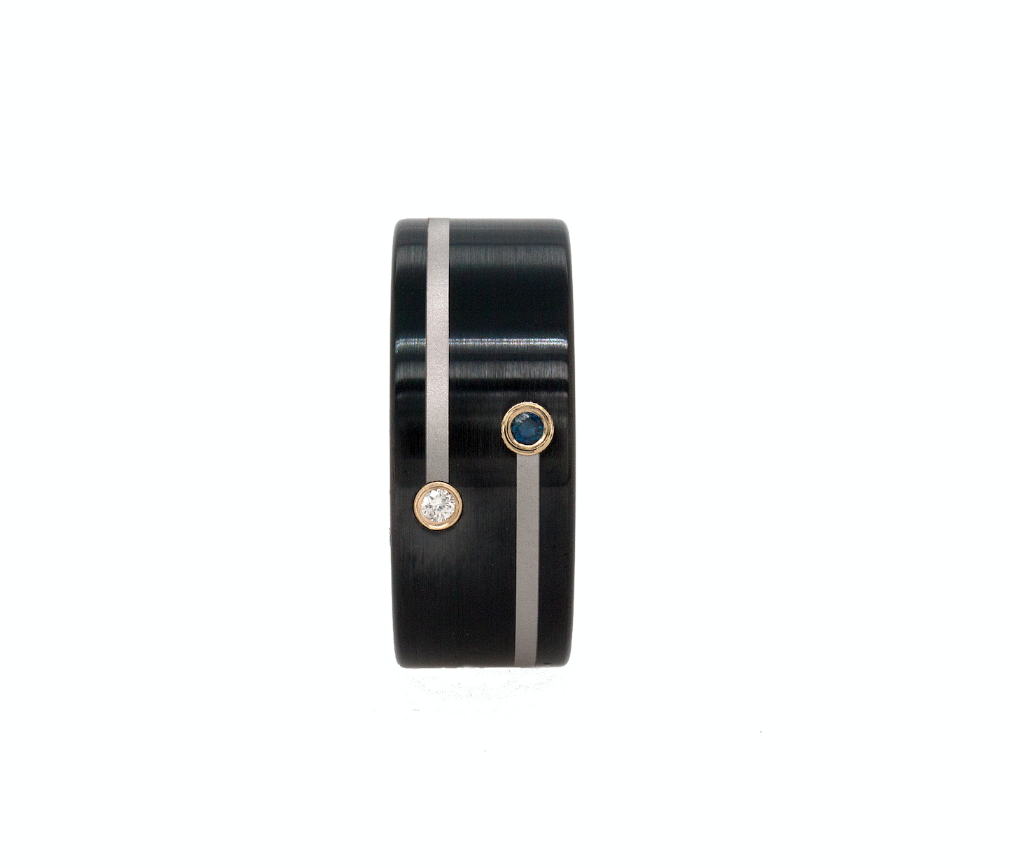 ring, ring on white background, black wedding band, black plated ring, ring with silver lines, ring with gemstones, gemstone ring, sapphire ring, diamond ring, wedding band for men, women's wedding band, personalized ring, personalized tungsten ring, pipe cut ring, black ring, brushed ring