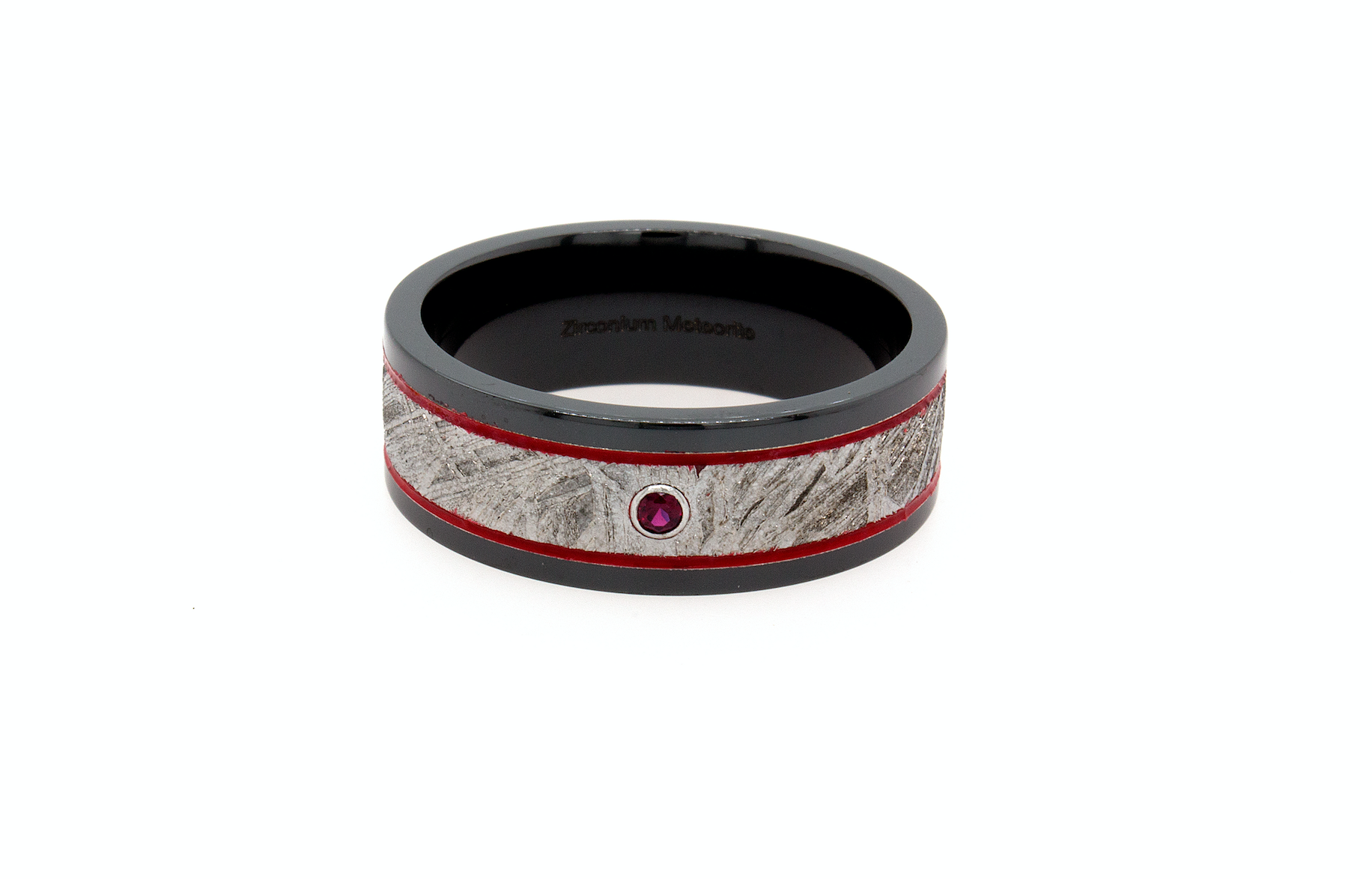 ring, ring on white background, black zirconium ring, black zirconium wedding band, wedding band, real meteorite ring, meteorite zirconium ring, garnet ring, round shaped garnet, ring with red lines, mens wedding band, women's wedding band
